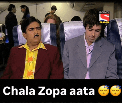 two men are sitting on an airplane with the caption ' chaka sopa aata ' on the bottom