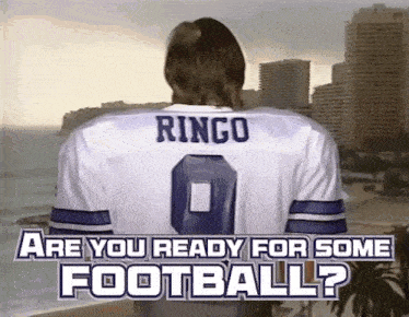 a man wearing a ringo jersey is standing in front of a city