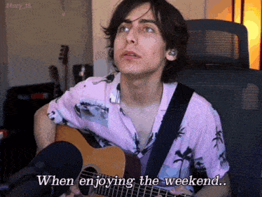 a man playing a guitar with the words when enjoying the weekend