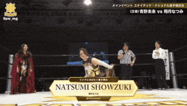a woman in a wrestling ring with the name natsumi showzuki on a sign