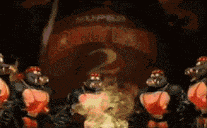a group of video game characters are standing in front of a super donkey kong 2 logo