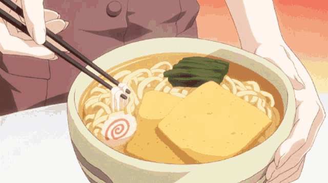 a person is holding a bowl of noodles with chopsticks in it