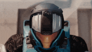 a man wearing a helmet with a camera on it