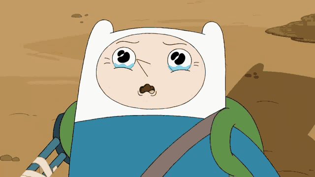 a cartoon character with a sad face and a tear running down his face