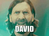 a man with long hair and a beard is screaming with the name david above him