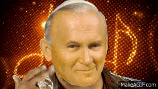 a close up of a man 's face with makeagif.com in the bottom right
