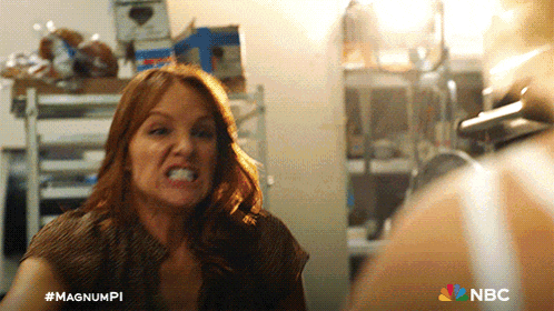 a woman is making a funny face with the nbc logo in the corner