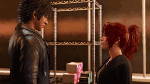a man and a woman looking at each other in a room
