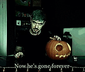 a man holding a carved pumpkin with the words " now he 's gone forever " below him