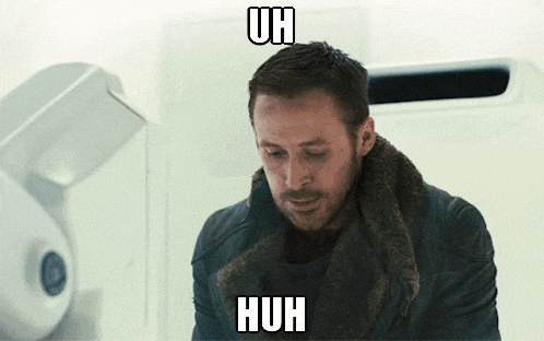 a man in a leather jacket says uh huh in front of him