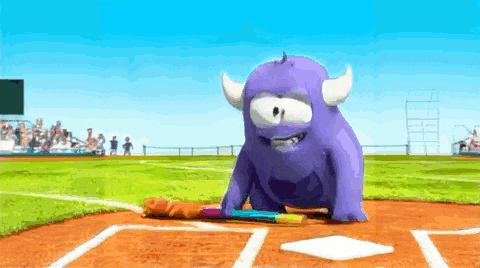 a purple monster is sitting on a baseball field with a bat