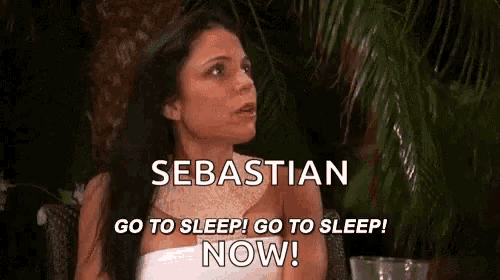 a woman is sitting in a chair with the words `` sebastian go to sleep , go to sleep now ! ''
