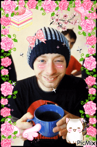 a picture of a man holding a cup of coffee with a picmix watermark on the bottom
