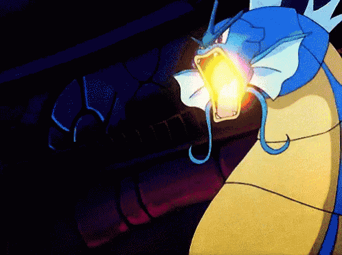 a blue and yellow pokemon with a light coming out of it 's mouth