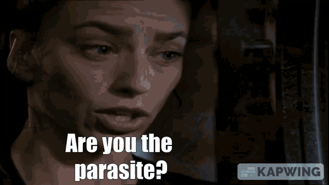 a close up of a woman 's face with the words " are you the parasite " above her
