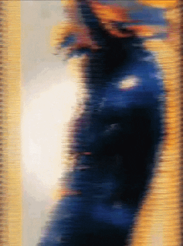 a blurry picture of a person 's face with a yellow border
