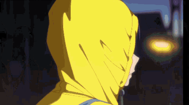 a person wearing a yellow hoodie with a hood that has a lightning bolt on it