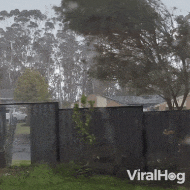 A Strong Storm Rips Away A Home'S Fence Viralhog GIF - A Strong Storm Rips Away A Home'S Fence Viralhog Storm Claws Fence From Home GIFs