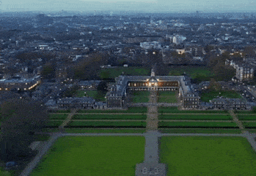 an aerial view of a large building in a city