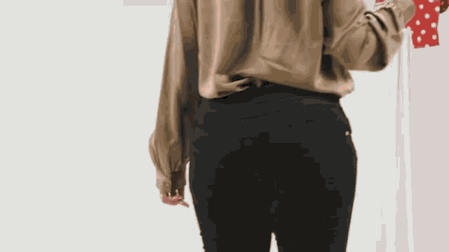 a woman 's butt is shown with an illustration of a peach behind it