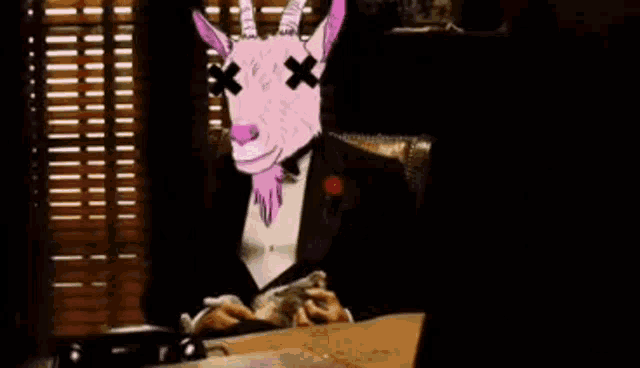 a man in a tuxedo with a goat head is sitting at a desk with a gun .