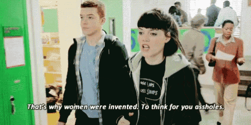 a man and a woman are walking in a hallway and the woman says that 's why women were invented .