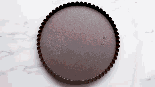 a chocolate pie in a pan on a table