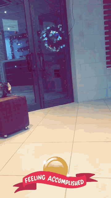 a picture of a door with a wreath on it and the words feeling accomplished