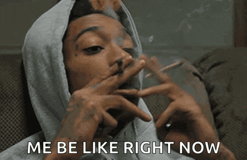 a man smoking a cigarette with the words " me be like right now " below him