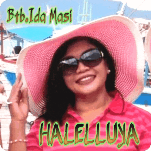 a woman wearing a pink hat and sunglasses has the name halelluna written on her shirt