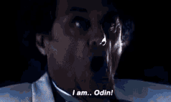 a close up of a person 's face with the words `` i am ... odin ! ''