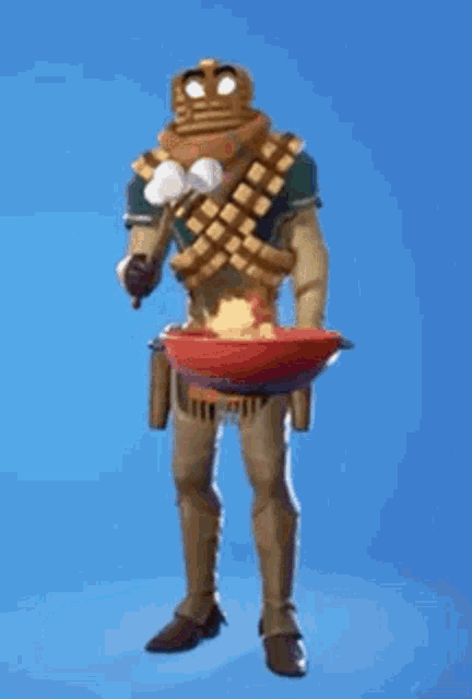 a man is standing next to a bowl of food and holding a stick of marshmallows .