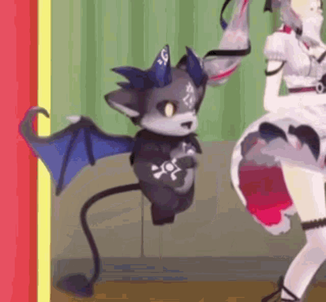 a cartoon character with wings is dancing next to a girl in a dress .