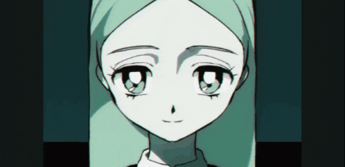 a close up of a girl 's face with a black background