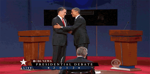 two men shake hands during a presidential debate
