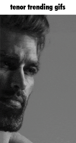 a black and white photo of a man with the words tenor trending gifs below it