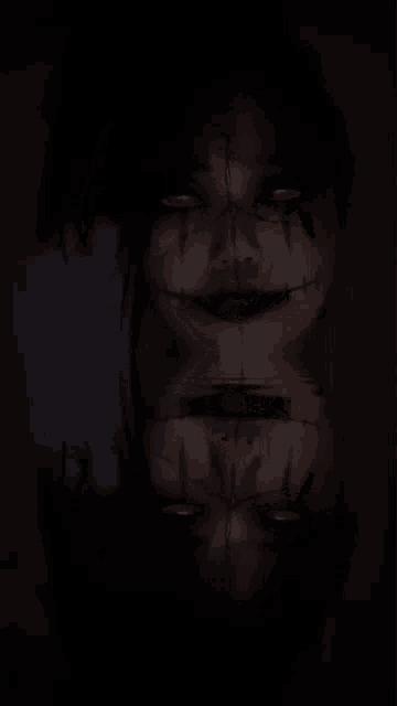a close up of a person 's face with stitches on it 's face