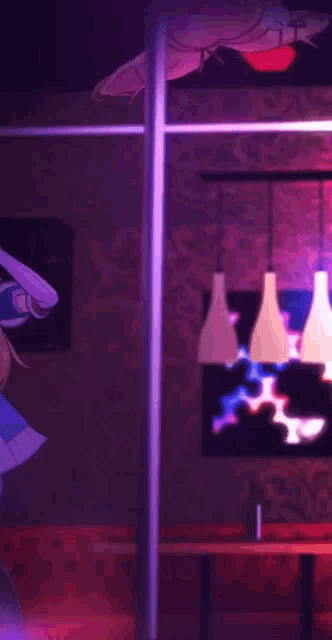 a girl is hanging upside down from a pole