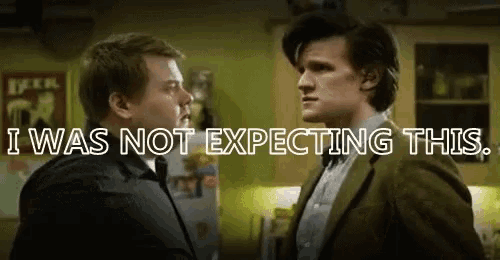 two men standing next to each other with the words " i was not expecting this " on the bottom