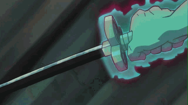 a person is holding a sword in their hand and it is glowing in the dark