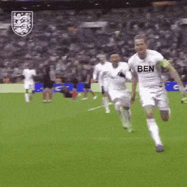 a soccer player wearing a shirt that says ben on it