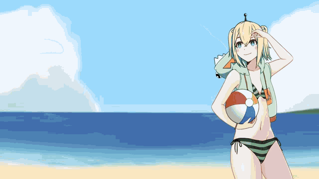 a girl in a bikini holding a beach ball on the beach