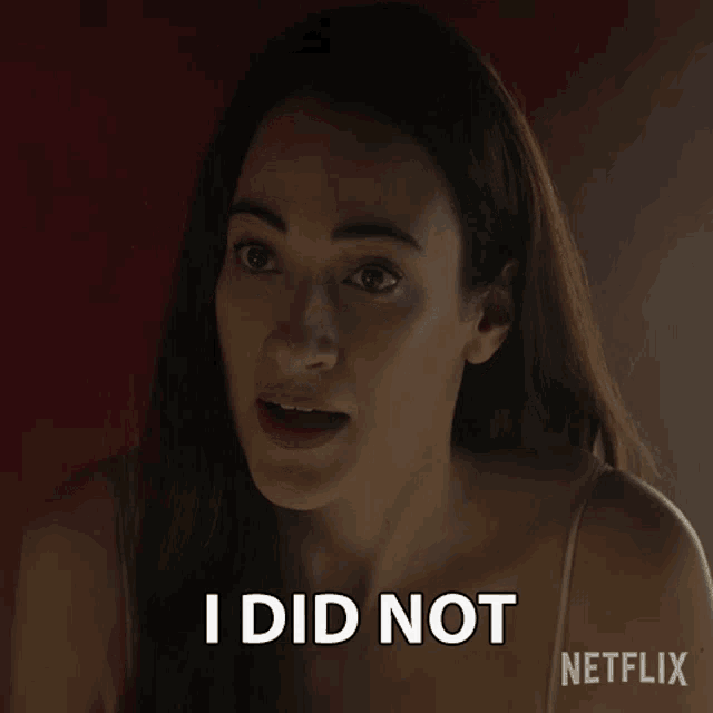 a woman says i did not in front of a red background