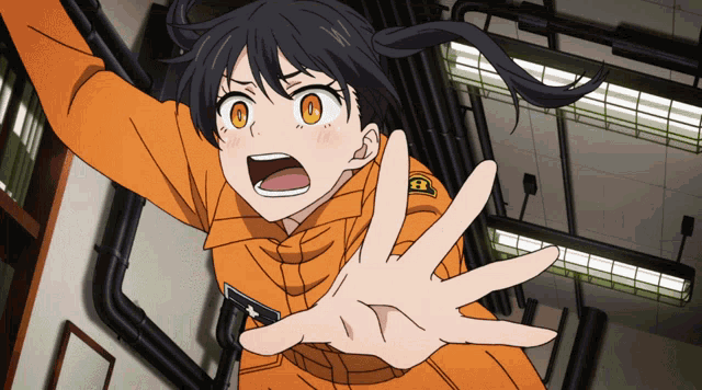 a girl in an orange uniform with a badge that says e on it