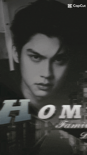 a black and white photo of a man 's face with the word home on it