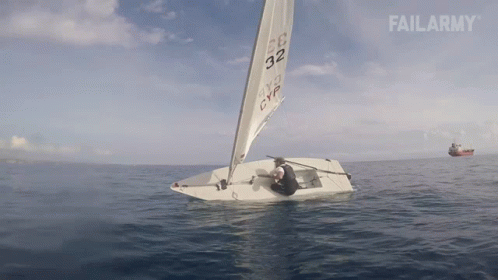 Tipped Over Sideways Sailboat GIF - Tipped Over Sideways Sailboat Lost Balance GIFs