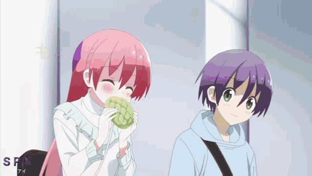 a girl with pink hair is eating a melon and a boy with purple hair is standing next to her