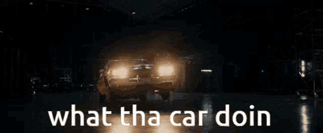 a dark room with the words what the car doin