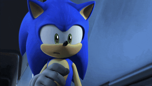 a close up of sonic the hedgehog 's face with a blue background