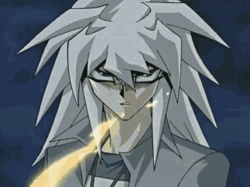 a close up of a cartoon character with a yellow flame coming out of his mouth